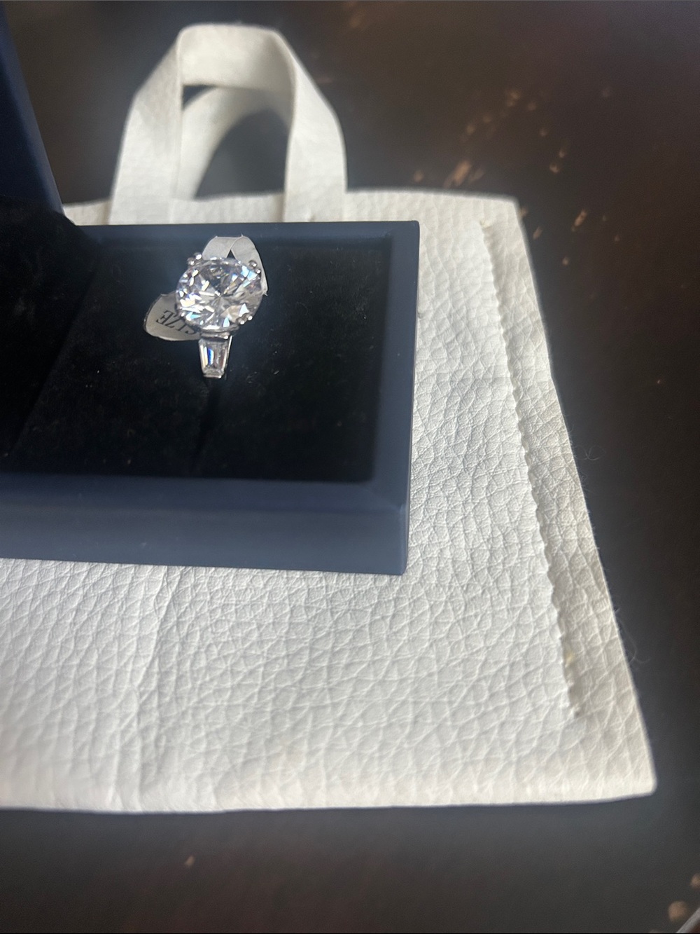 Classic Silver-Tone Round-Cut Engagement Ring with Clear Stone